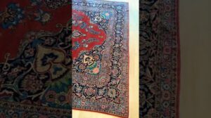 Alter Persischer KASHAN-Teppich mit natürlichen Farbtönen.