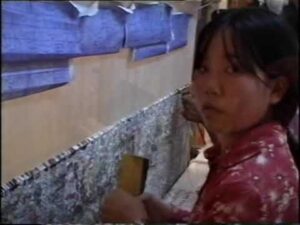 Chinesische Kunst: Herstellung von Seidenteppichen in Xi'an