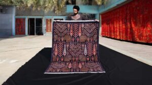 Der 5x7 Dunkelviolette Gabbeh-Teppich: Ein Meisterwerk afghanischer Kunst