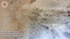 Reinigung eines antiken persischen Kashan-Teppichs