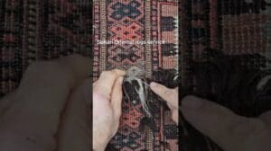 Restaurierung eines antiken afghanischen Baluchteppichs